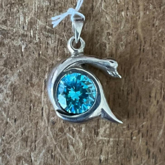 The round blue CZ in the abstract Duck Pendant - Sterling Silver